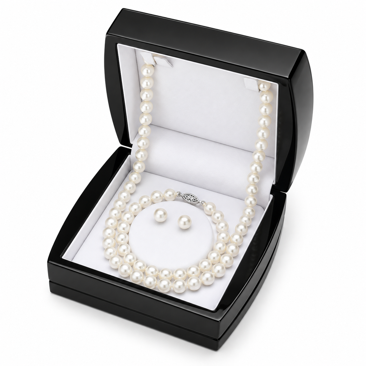 This elegant jewelry set includes a freshwater pearl necklace, matching bracelet, and classic stud earrings. Each piece features luminous 7.5–8mm pearls, creating a timeless ensemble perfect for special occasions or everyday sophistication.