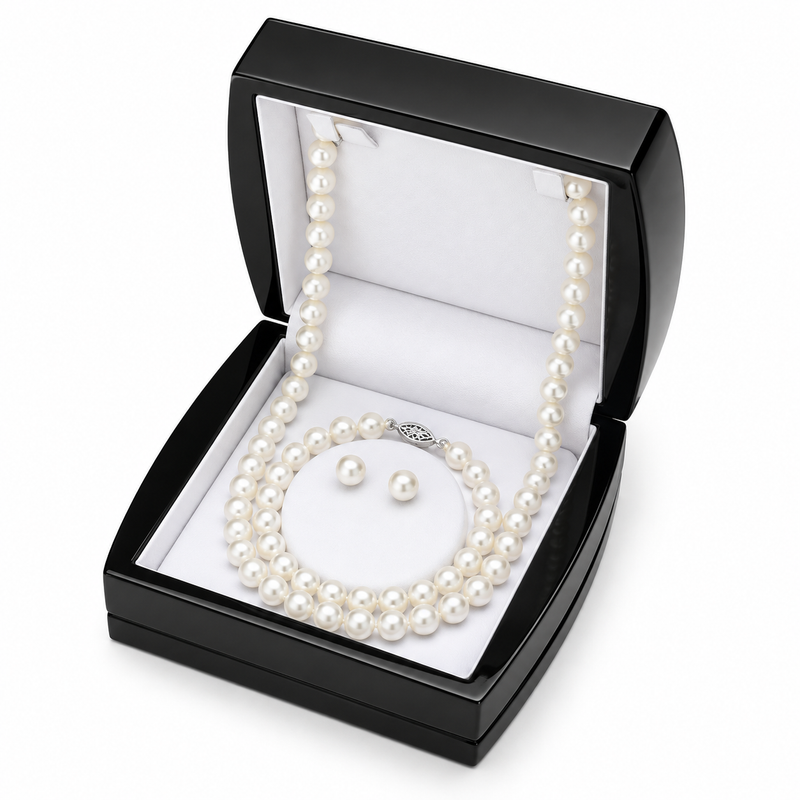 This elegant jewelry set includes a freshwater pearl necklace, matching bracelet, and classic stud earrings. Each piece features luminous 7.5–8mm pearls, creating a timeless ensemble perfect for special occasions or everyday sophistication.