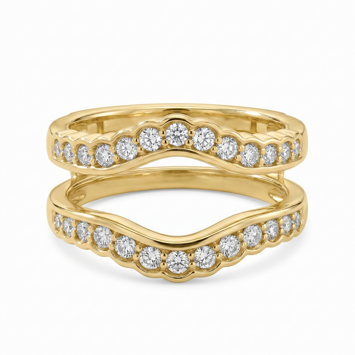 This yellow gold ring guard features two diamond-lined bands totaling 5/8 carat total weight, with scalloped curves designed to frame an engagement ring. The open center and flowing silhouette add beautiful brilliance and dimension while also making a striking stackable style.
