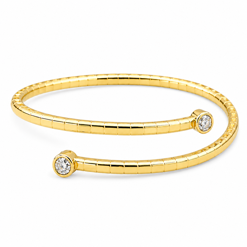 Two bezel-set diamonds meet at the center of this refined 14K yellow gold Flexie bracelet, creating a modern focal point with delicate balance and sparkle. The polished beaded design offers flexible comfort while 1/3 carat total weight of diamonds adds an elegant everyday glow.