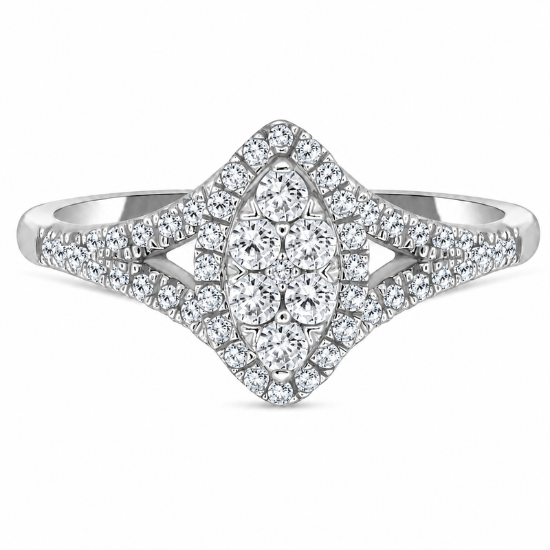 A marquise-shaped cluster of round diamonds takes center stage in this elegant 10K white gold promise ring. Framed by a sparkling halo and accented with diamond-lined split shoulders, the 1/4 carat total weight design offers eye-catching brilliance and timeless style. A meaningful piece to celebrate love, commitment, or a special milestone.
