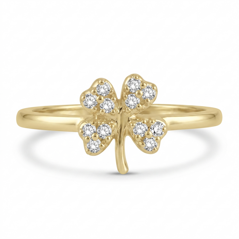 A symbol of luck with a touch of sparkle, this four-leaf clover ring features 1/10 carat total weight of diamonds set in warm 10K yellow gold. The delicate silhouette and meaningful design make it an effortless piece for everyday wear or thoughtful gifting.