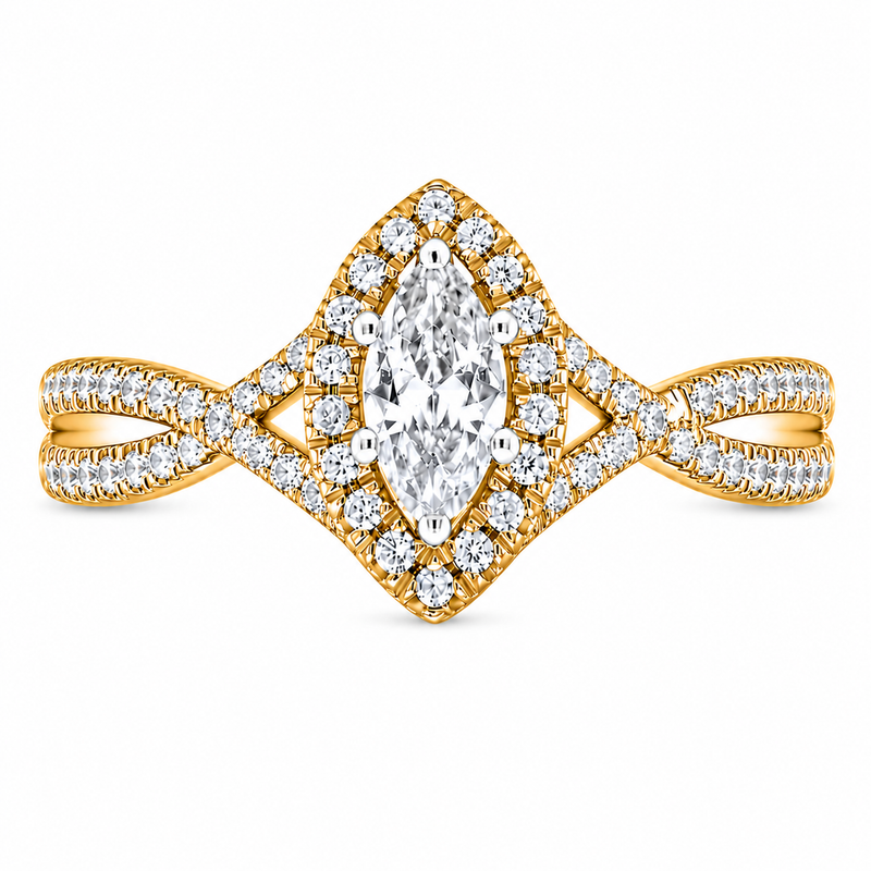 Featuring a striking elongated silhouette, this engagement ring centers a 1/5 CT marquise-cut diamond framed by a glittering halo and a split, diamond-paved band. Crafted in warm 10K yellow gold with 1/3 CTW of total brilliance, its intricate design delivers regal elegance and maximum sparkle. All of our diamonds are 100% natural, earth-mined, and ethically sourced.