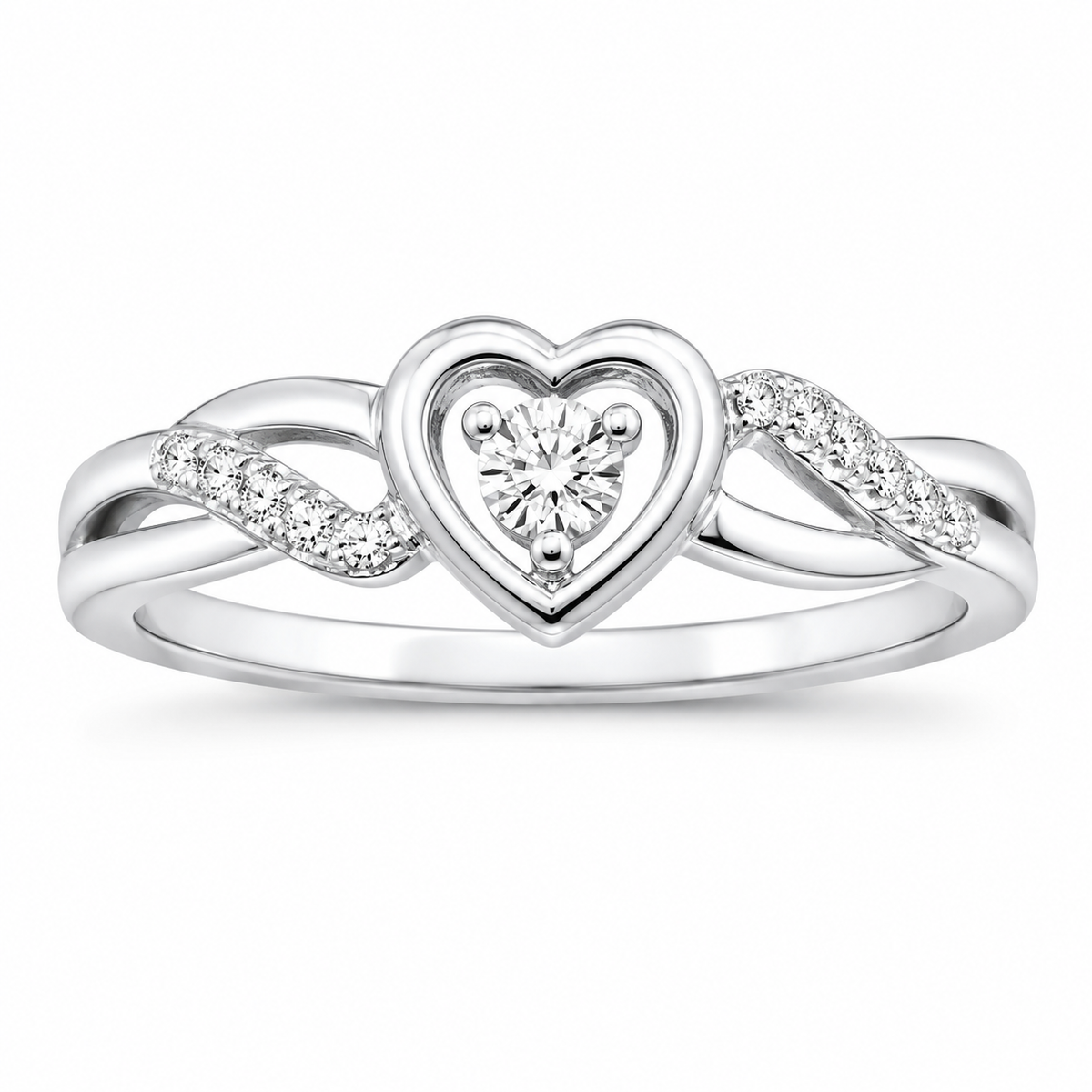 A silver heart-shaped ring with a central heart-shaped diamond and small diamonds along the band, shown on a plain white background.