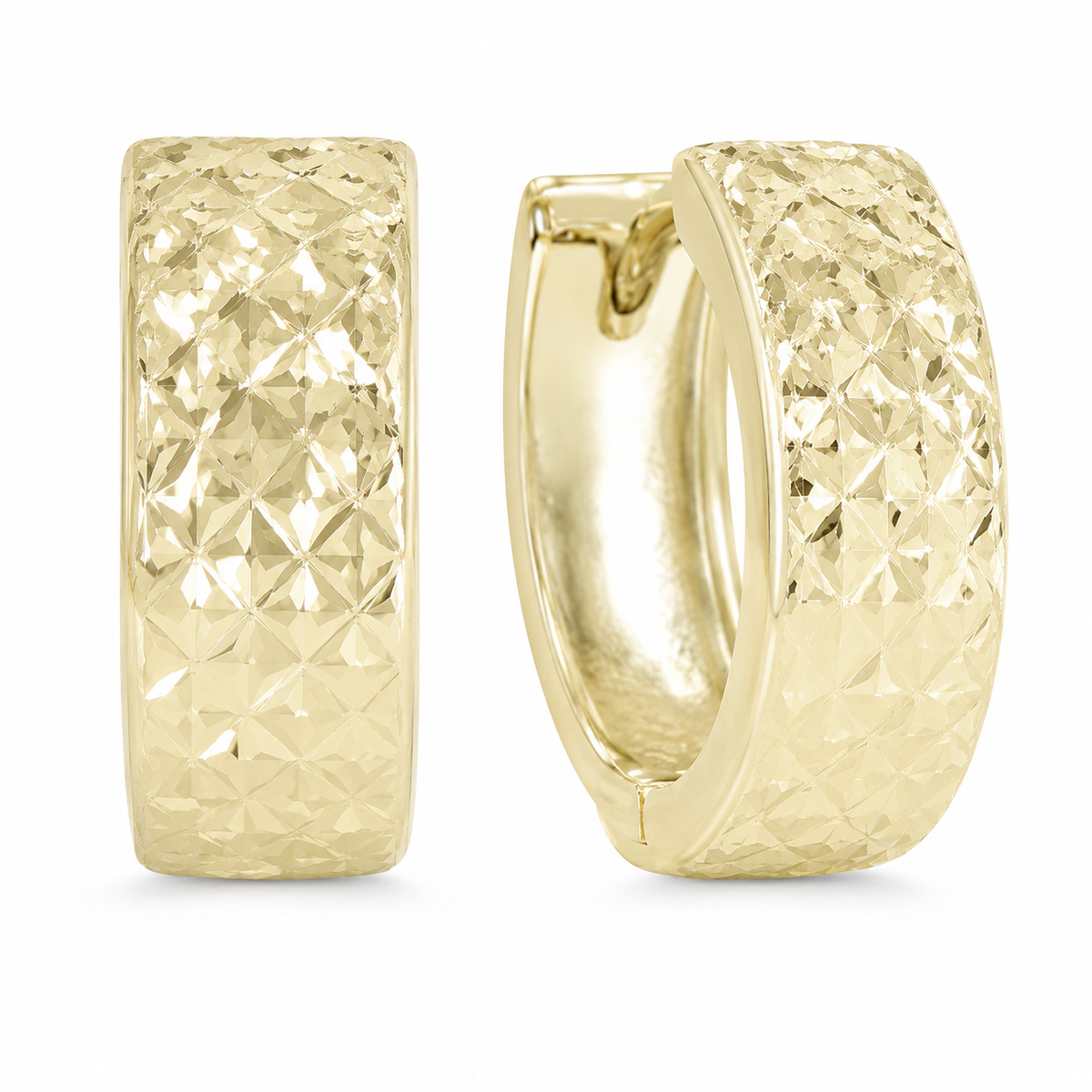 A full diamond-cut pattern creates a faceted surface that sparkles with every movement, giving these 10K yellow gold hoops a bold, light-catching finish. Their softly rounded profile and hinged design make them an easy statement piece for day or evening wear.

Measures 4.99MM, 13, 12.12MM.