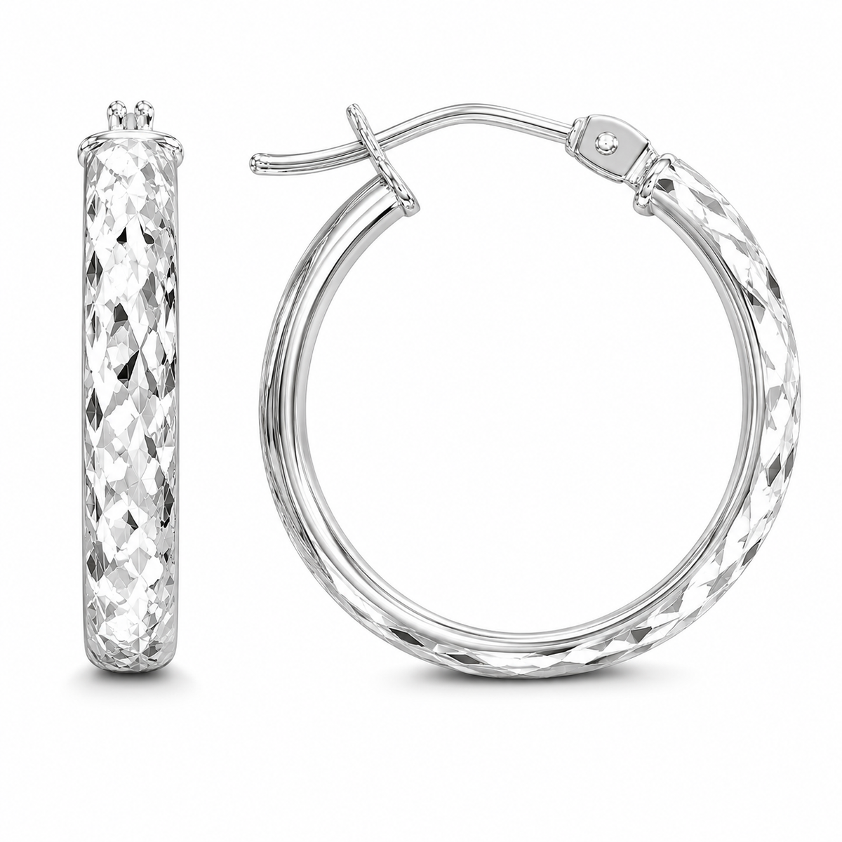 A full diamond-cut finish gives these 10k white gold hoops exceptional sparkle, creating a faceted surface that catches and reflects light from every angle. Their rounded silhouette and hinged closure offer timeless style with an elevated, shimmering finish.

Measures 3.65MM, 14.3, 18.15MM.