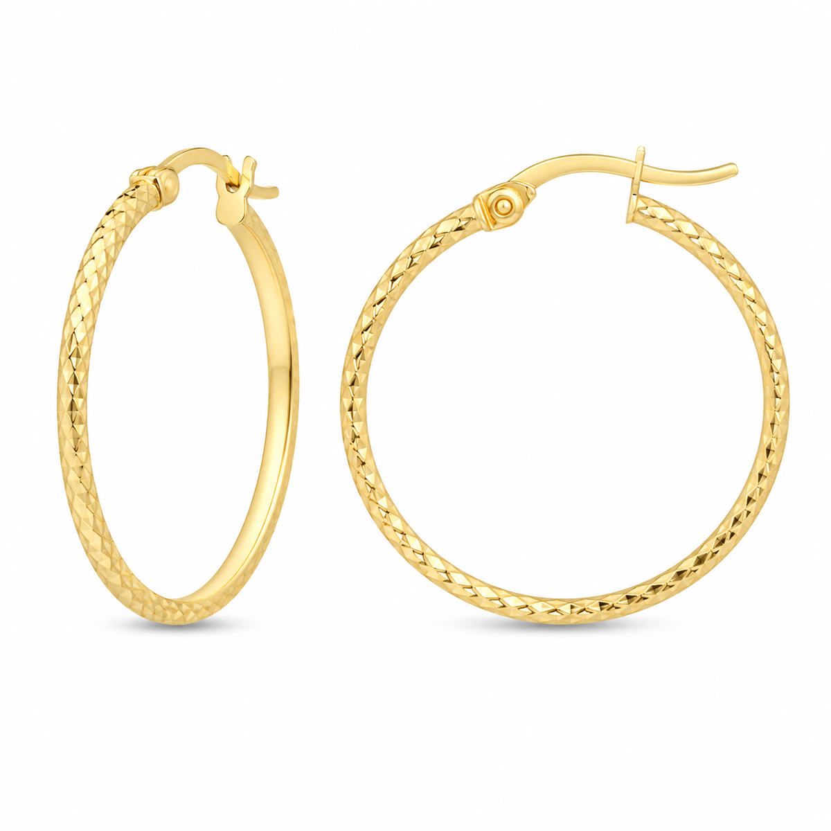 A diamond-cut finish gives these classic 10K yellow gold hoops a light-catching shimmer from every angle. Their slim, rounded profile and hinged design make them an effortless everyday staple with added brilliance.

Measures 1.44MM, 17.8, 19.13MM.