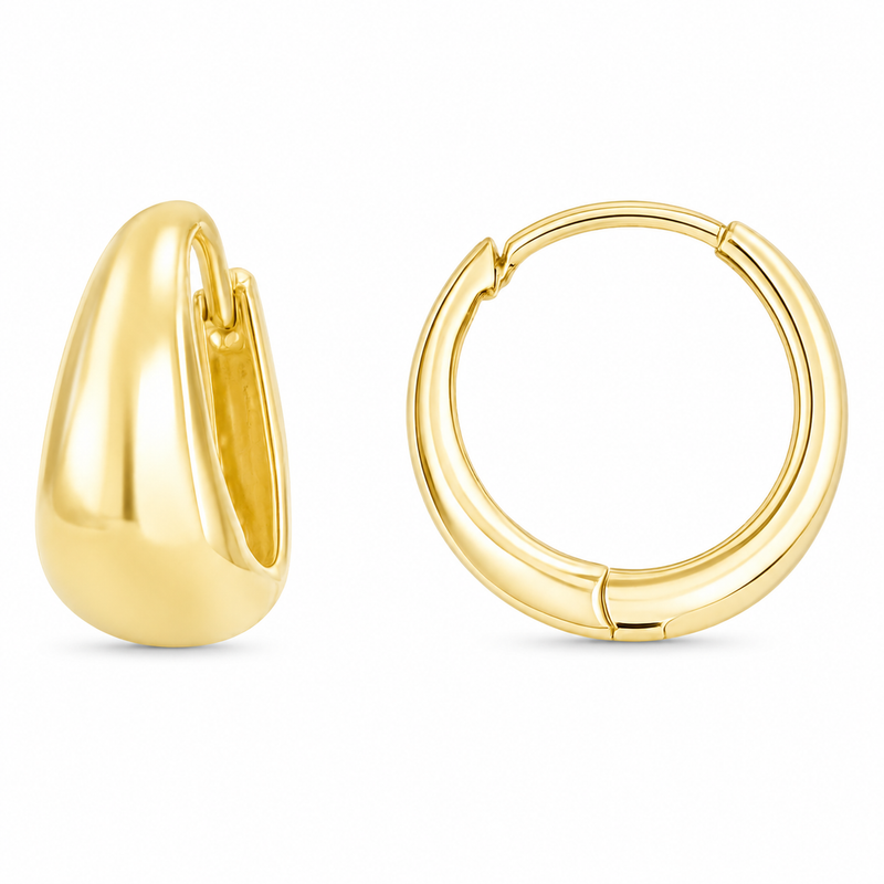 These polished 10K yellow gold hoops feature a softly tapered silhouette that creates a bold, sculpted look in a compact size. Their smooth curves and rounded profile make them an effortless staple with contemporary appeal.

Measures 6.27MM X 11.25MM.