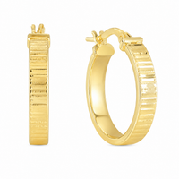 A pair of gold hoop earrings with a textured, ribbed exterior and a polished interior, shown on a plain white background. 4X14.23X15.6MM