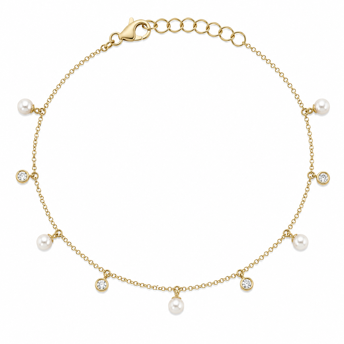 Description: Lustrous pearls and bezel-set round diamonds alternate along a delicate 14K yellow gold chain. The diamonds total 1/20 carat total weight, while the dangling design adds soft movement and a playful finish.